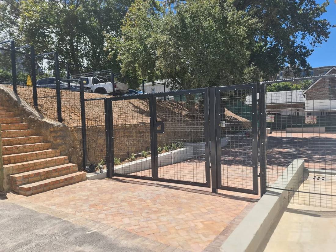 Mesh pedestrian security gate installation